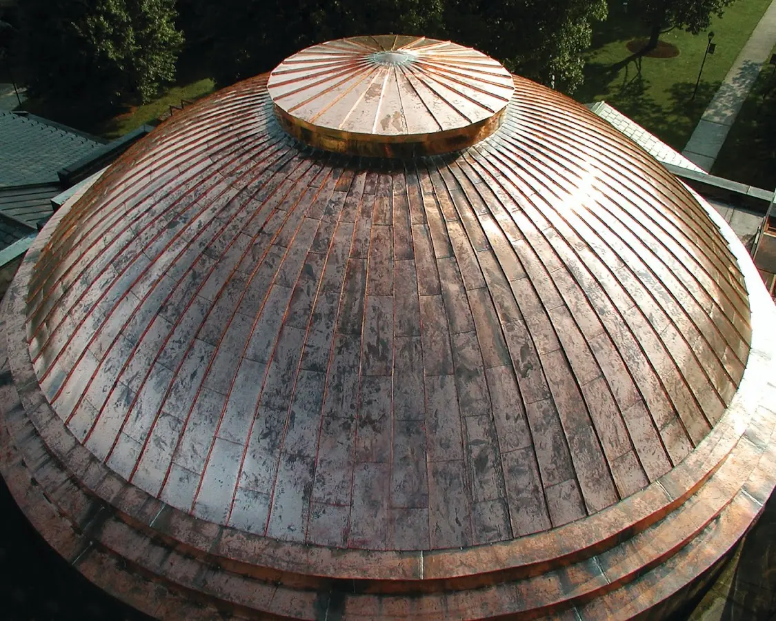 Craftsman Roofing crew installing a new roof in Mount Sinai